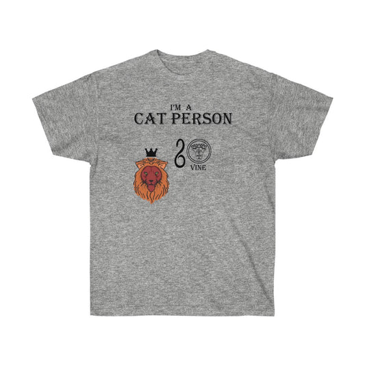 A gray shirt. It has a lion based on Vine in the middle. At the top, there is text that reads "I'm a cat person." Below that is a lion wearing a black crown. Beside the lion is the silhouette of a viper, Vine's sigil and the name "Vine" underneath the sigil.