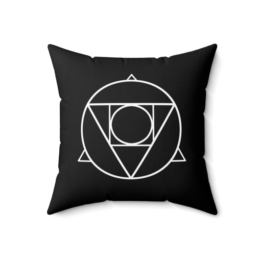 A black throw pillow. It features a white stylized philosopher's stone alchemical symbol in the middle of it.