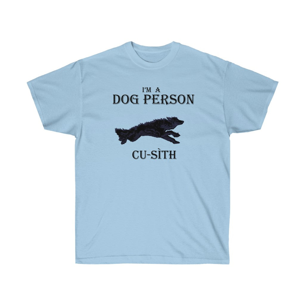 A blue shirt. It has a graphic of Cu-Sith in the middle. At the top, black text reads "I'm a dog person." At the bottom, black text reads "Cu-Sith."