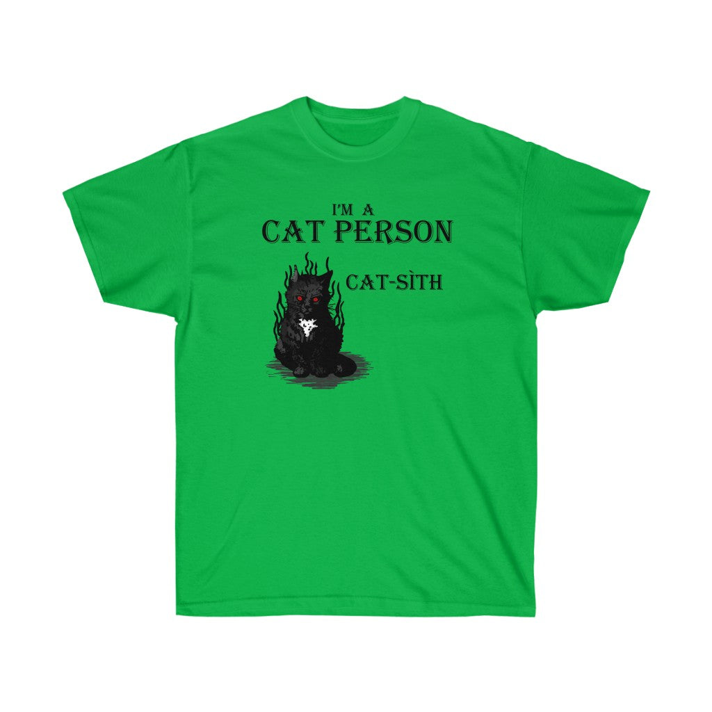 A green shirt. It has a cat based on Cat-Sìth in the middle. At the top, there is text that reads "I'm a cat person." Below the text is a black cat with shadowy tendrils emerging from it. It's eyes are red. Beside the cat is the name "Cat-Sìth"