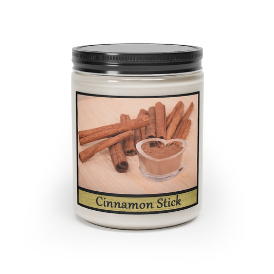 A cinnamon stick candle sitting on a white background. The label features several cinnamon sticks layed beside each other on a wooden slab. There's crushed cinnamon sticks in a heart shaped container sitting in front of them. The words "cinnamon stick" are below the picture.