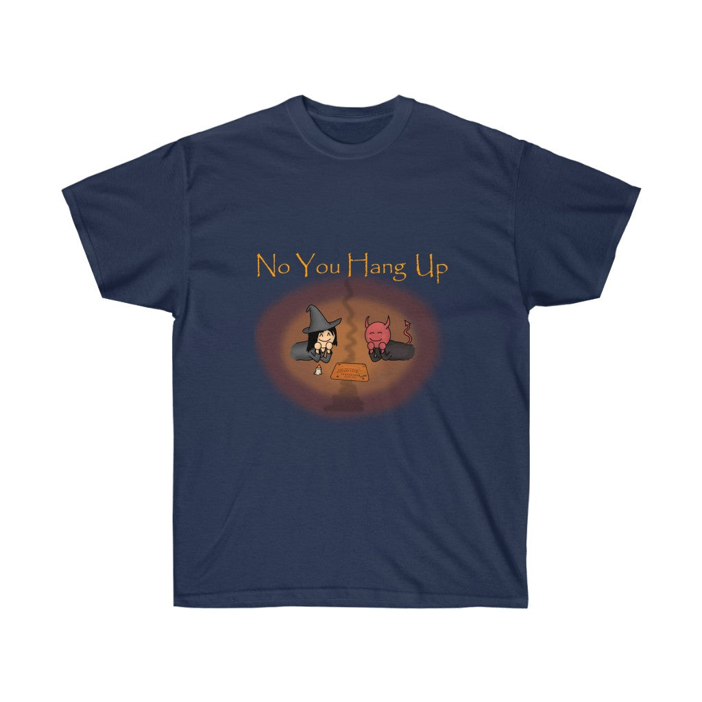 A dark blue shirt with golden text saying "No you hang up". The graphic on the shirt is depicting a witch and a demon talking via a Ouija board. There's a reddish orange and orange circle around the graphic.