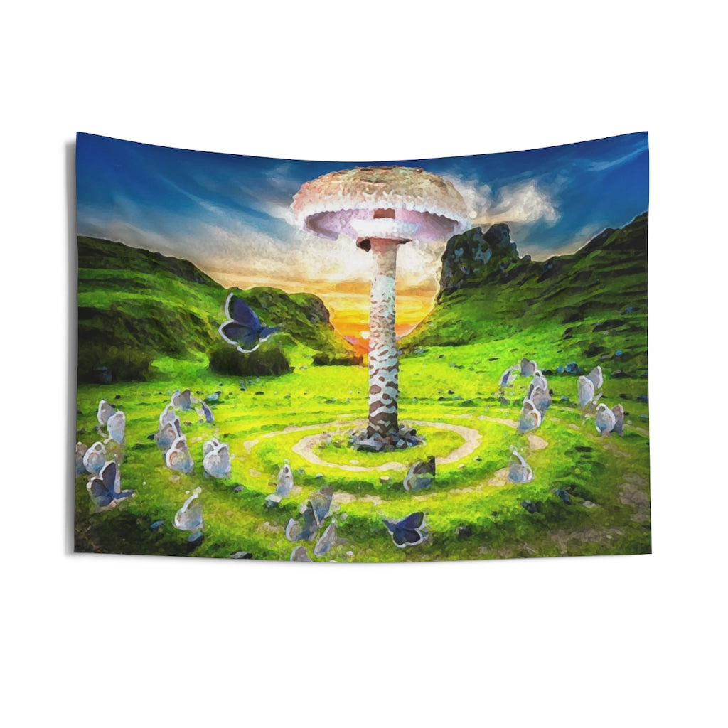 A field with a giant mushroom growing in the middle of a fairy ring. In the foreground, butterflies are flying bye. The sun is setting behind some mountains framing everything in the background.