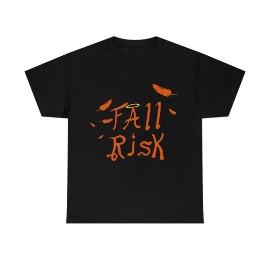 A black shirt with orange text that reads "Fall Risk". There's feathers strewn about. A halo sits above the A. The r has a devils tail, the I is a candle, the S is a snake, and the K has cloven hooves.