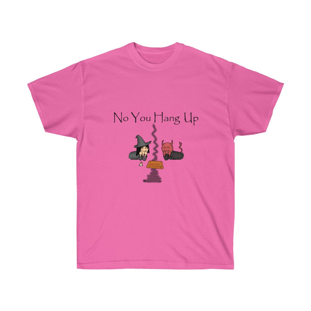 A pink shirt with black text saying "No you hang up". The graphic on the shirt is depicting a witch and a demon talking via a Ouija board.