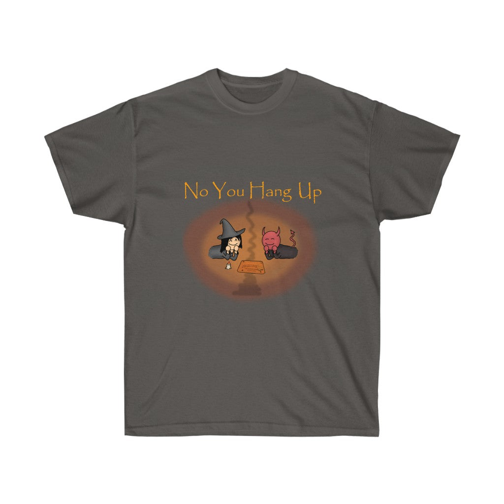 A gray shirt with golden text saying "No you hang up". The graphic on the shirt is depicting a witch and a demon talking via a Ouija board. There's a reddish orange and orange circle around the graphic.