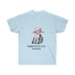 A light blue shirt featuring a graphic of a demon in a white shirt and skirt with a red tie sitting in a wheelchair. Below the graphic, there is black text reading "Sleep paralysis demon" with sleep crossed out.
