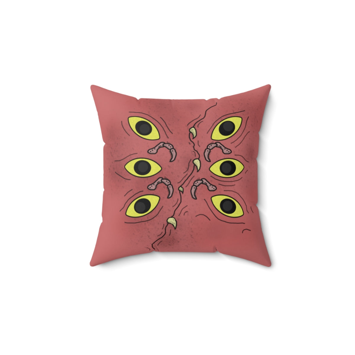 A dark pink throw pillow with specs of black designed to make it look a little dirty. It's stylized to look like a ghoulish mimic. It has 6 eyes, 3 on each side, multiple legs akin to a hermit crab (Segmented with hairs on them, curving at each segment), and a curved "mouth" going through the center with multiple teeth popping out.