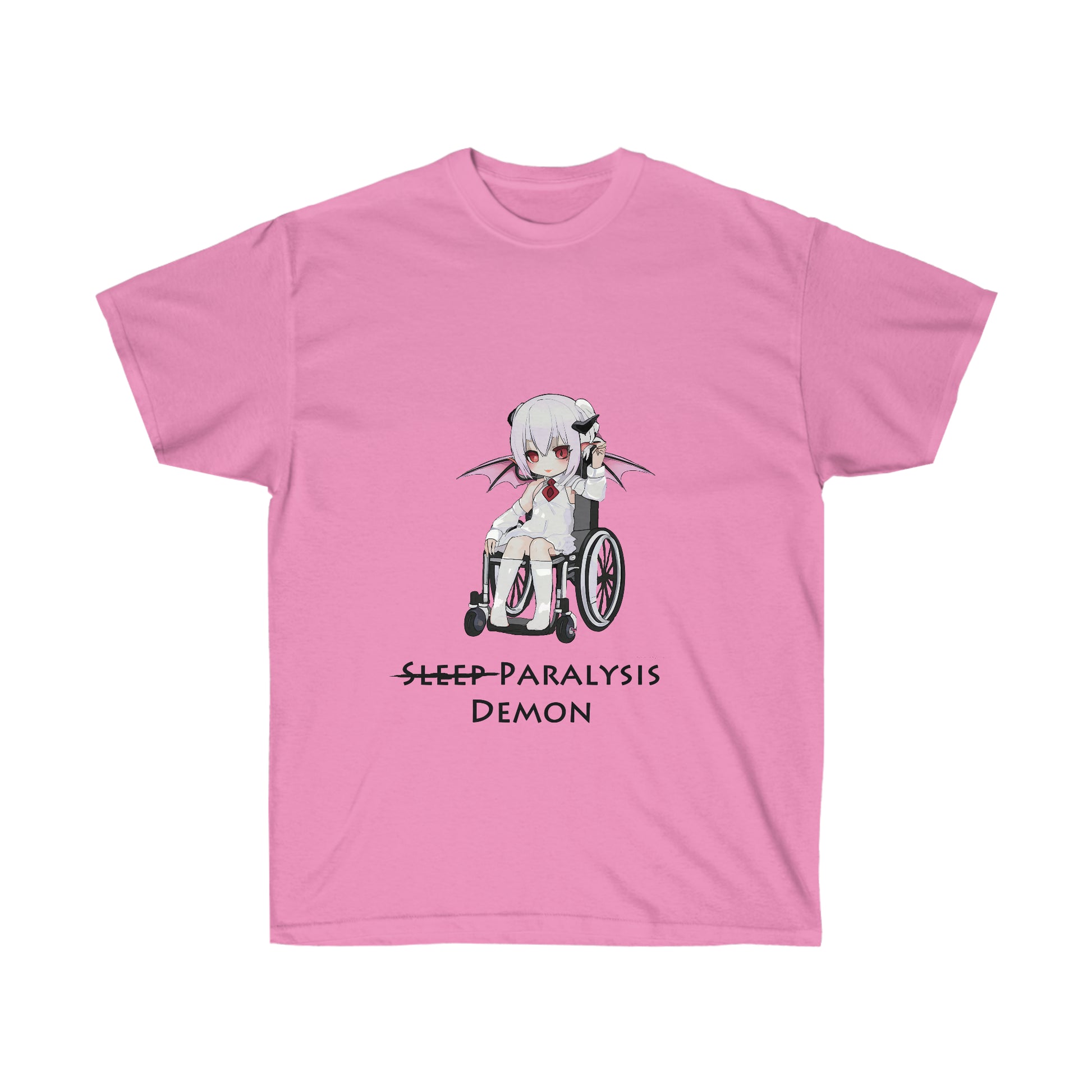 A pink shirt featuring a graphic of a demon in a white shirt and skirt with a red tie sitting in a wheelchair. Below the graphic, there is black text reading "Sleep paralysis demon" with sleep crossed out.